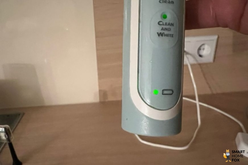 The charging indicator light of an electric toothbrush.